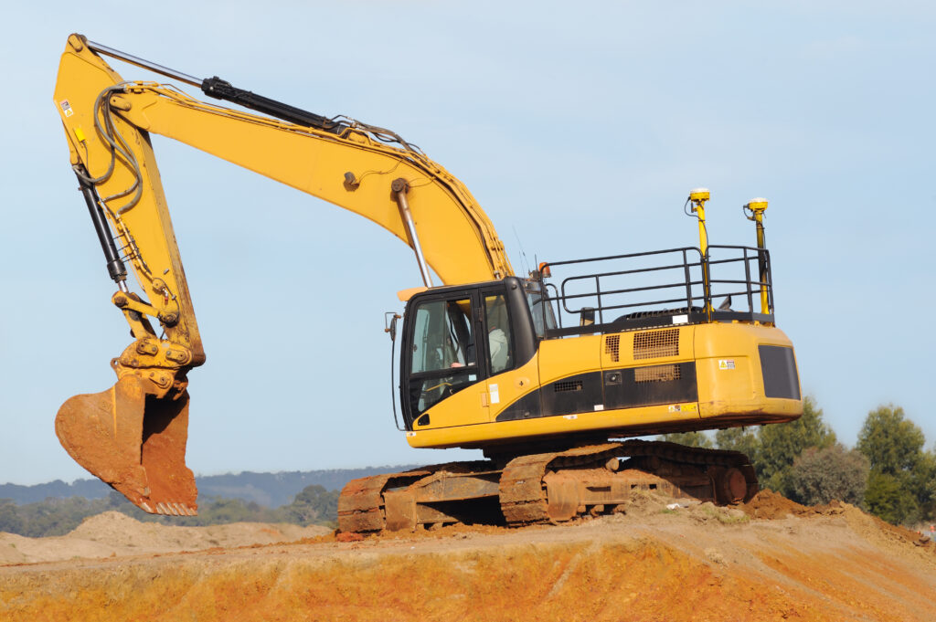 iStock 184145987 – TCL Consulting Excavator equipped with dual GPS antennas performing earthwork based on cut and fill calculations to achieve precise site grading.