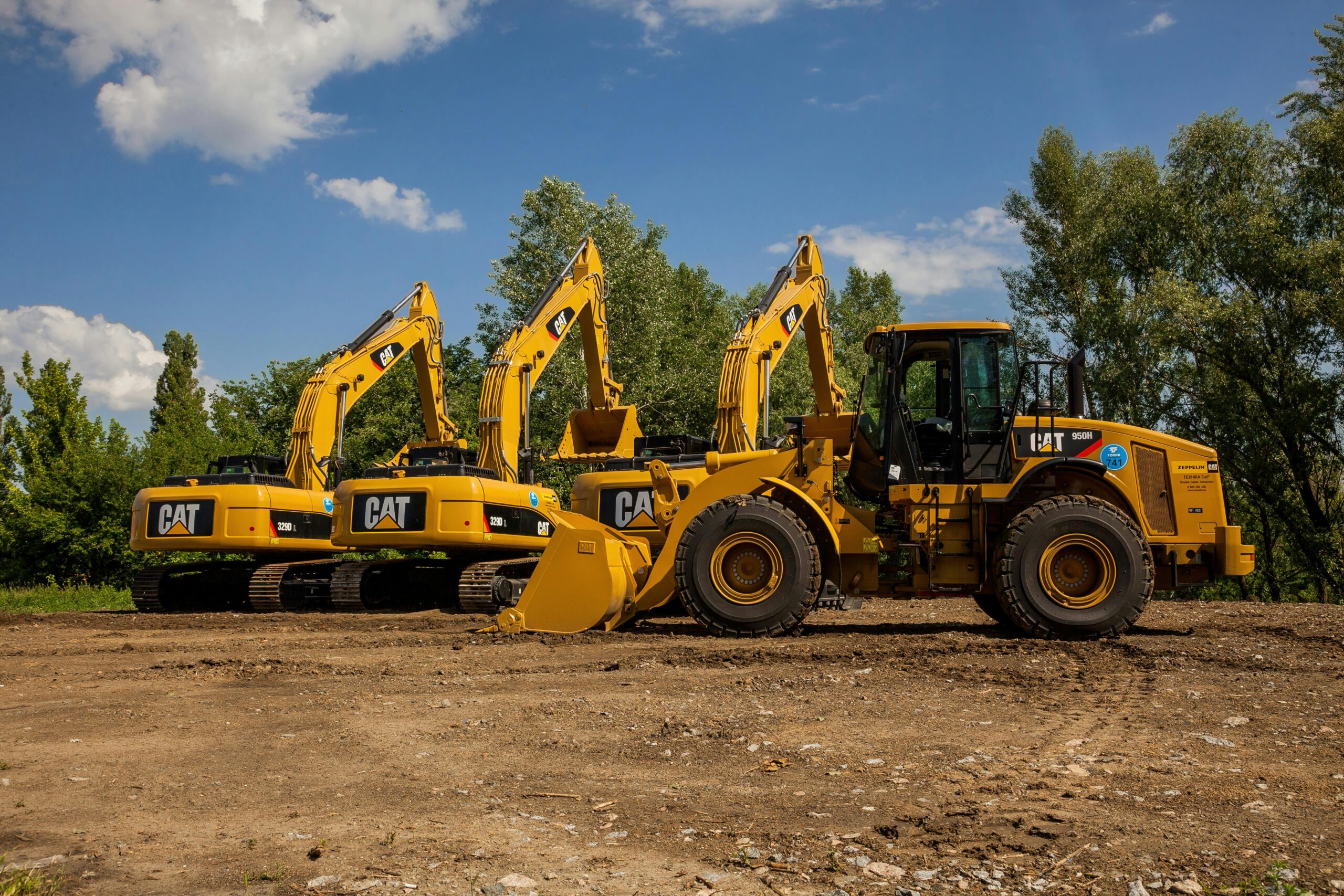 "A split-screen image showcasing construction machine control technology: on the left, a bulldozer leveling soil at a construction site under a clear sky; in the center, a digital display showing real-time 3D terrain data for machine control; on the right, an excavator performing precise grading work in a similar outdoor setting."